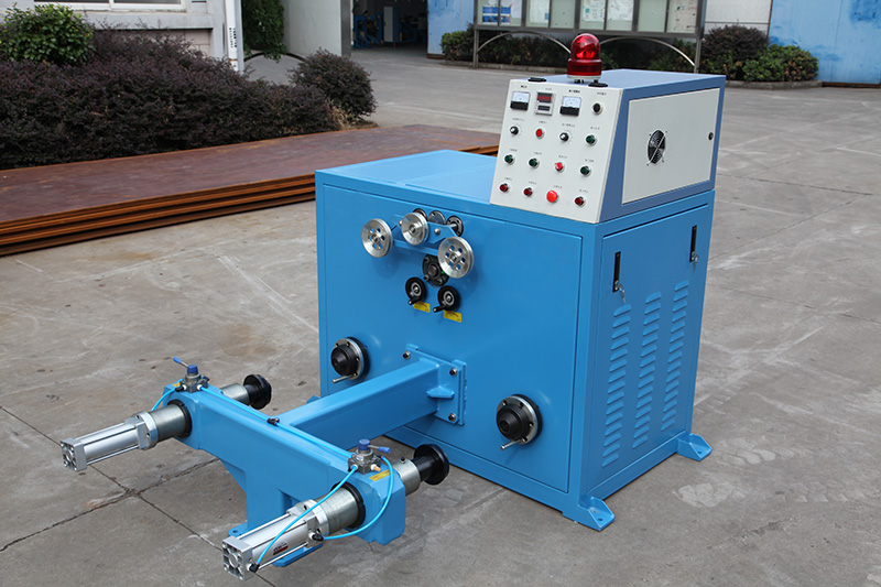 Double spool pneumatic take up without shaft